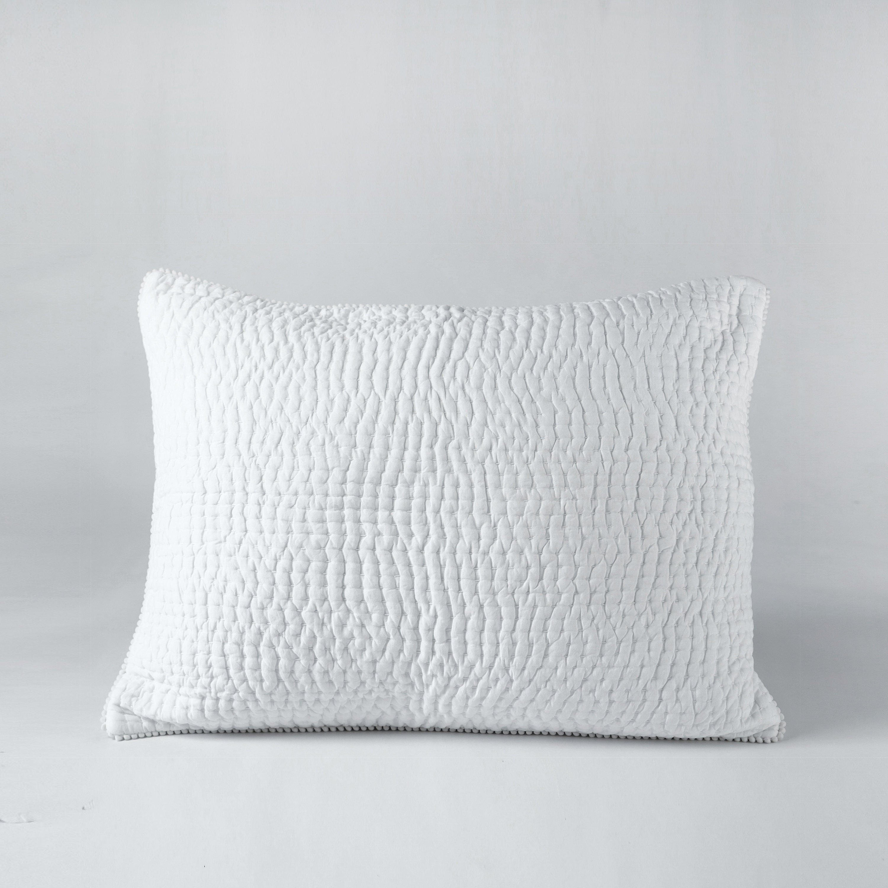 white quilted pillow cases