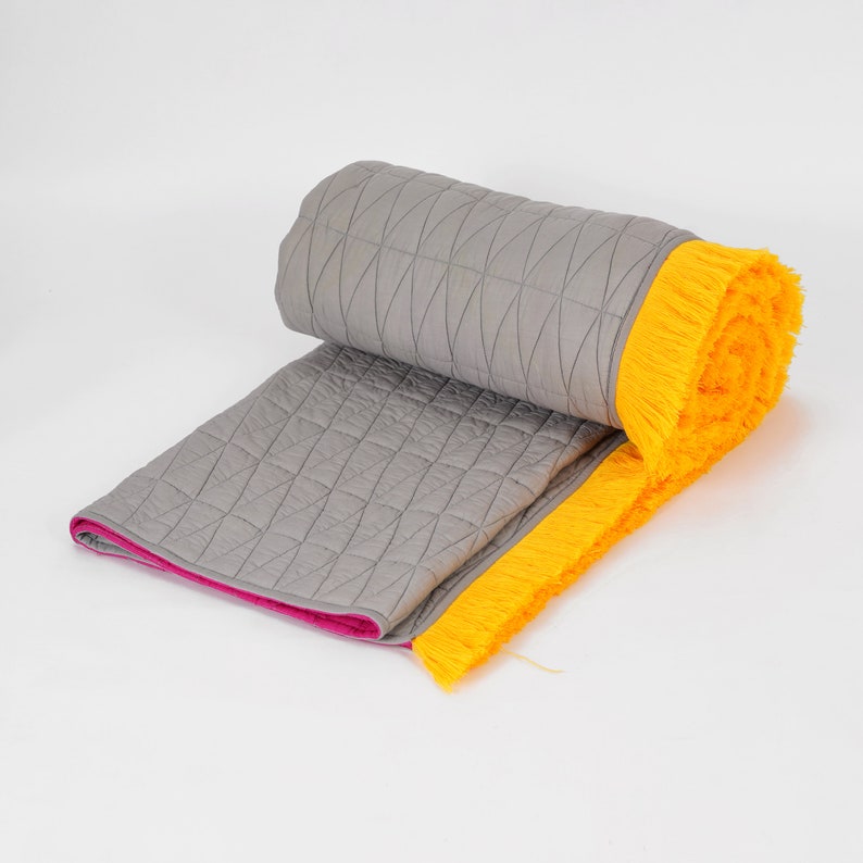 Reversible Bohemian quilted bedspread with fringe Grey and hot pink Sizes available