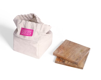 Pack of 6 or 4 mango wood coasters packed in a canvas drawstring bag.