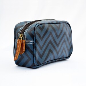 Blue toiletry bag, chevron print, laminated bag, leather trims,  make up or cosmetic bag, utility pouch.
