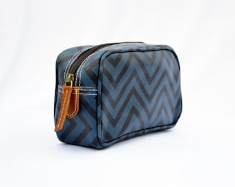 Blue toiletry bag, chevron print, laminated bag, leather trims,  make up or cosmetic bag, utility pouch.