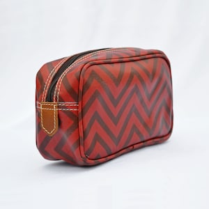 Red toiletry bag, chevron print, laminated bag, leather trims,  make up or cosmetic bag, utility pouch.