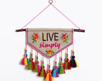 Quotation Wall art embroidered triangular linen wall art with multicolour tassels