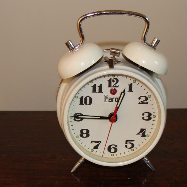 Vintage alarm clock. Not defective, working.