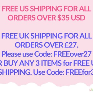 May include: Pink background with text in pink and blue. The text reads: FREE US SHIPPING FOR ALL ORDERS OVER $35 USD. FREE UK SHIPPING FOR ALL ORDERS OVER &pound;27. Please use Code: FREEover27 OR BUY ANY 3 ITEMS for FREE UK SHIPPING. Use Code: FREEfor3.