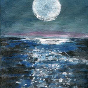 May include: An acrylic painting depicts a nighttime seascape. A large, textured, white moon dominates the upper portion against a dark blue sky. The ocean below is rendered in shades of blue and black, with white highlights suggesting moonlight on the water.