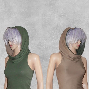May include: Two sleeveless tops with a cowl neck and a hood. One top is olive green and the other is beige.
