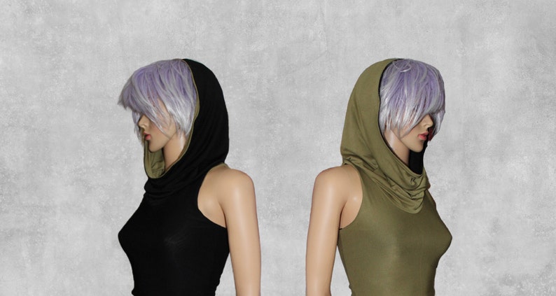 May include: Two sleeveless tops with a cowl neck and a hood. The top on the left is black with a green trim. The top on the right is green with a black trim.
