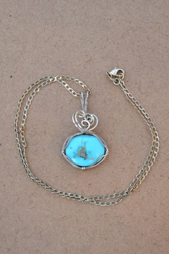 Turquoise Pendant With Fancy Sterling Silver Wire 