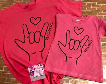 Camiseta en lenguaje de señas para adultos con la frase "Te amo"