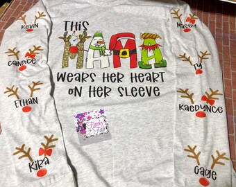 Mamá lleva su corazón en su camisa de manga larga para adultos