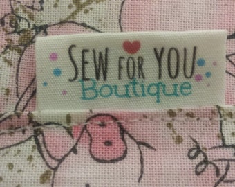 fabric folded labels  heat sealed edges no fraying  personalized with your logo doll clothes, pocket books, clothing ,quilts ,plushies,