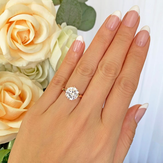 Solitaire ring on hand deals