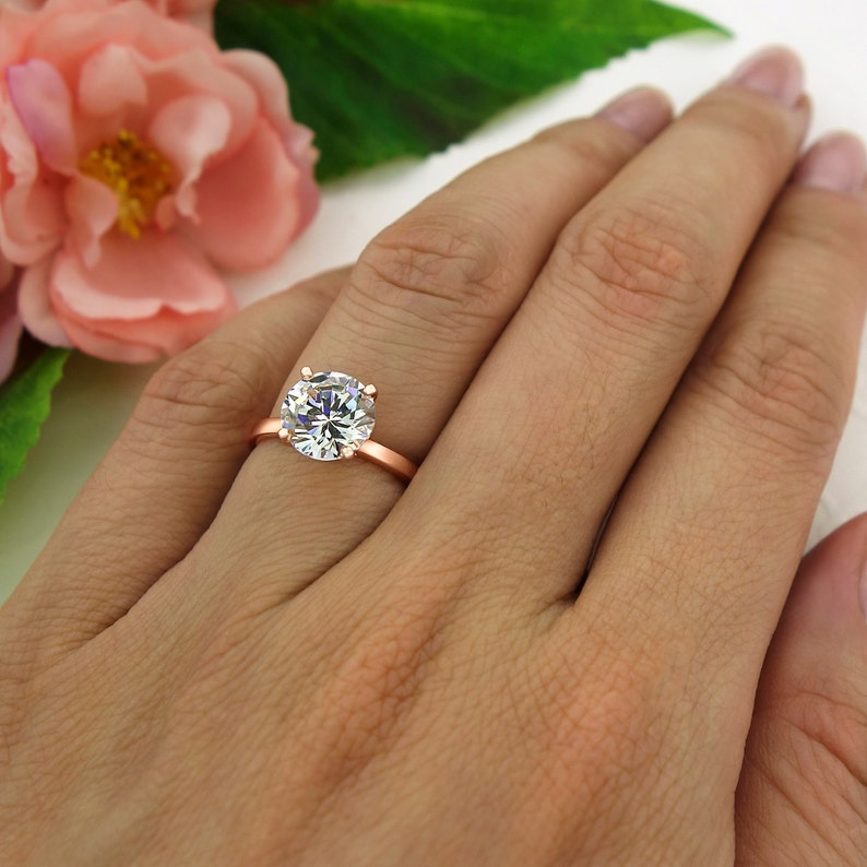 4 prong round solitaire engagement rings