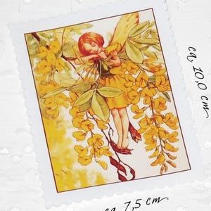May include: A rectangular card with a scalloped edge features a fairy illustration. The fairy, with red hair and yellow wings, is nestled among yellow flowers and green leaves. The card measures approximately 10 cm by 7.5 cm.