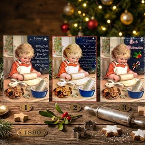 May include: Three rectangular cards featuring a vintage illustration of a child baking with a rolling pin, a bowl, and cookies. The cards display German text including 'Rezept' and 'Frohe Weihnachten'. The scene is set on a wooden table with a metal rolling pin, star-shaped cookie cutters, and star-shaped cookies.