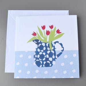 Jug of tulip flowers blank card