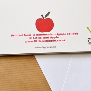 May include: Back of a greeting card with a red apple illustration and the text "Printed from a handmade original collage &copy; Little Red Apple www.littleredapple.co.uk www.sixprint.co.uk" and a green leaf logo with the text "Woodland CARBON www.woodlandcarbon.co.uk 07SXPR"