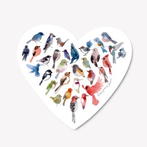 May include: A heart-shaped sticker featuring a watercolor illustration of various birds in shades of blue, red, green, and brown. The birds are arranged to form the heart shape. The artist's signature is visible on the lower right.