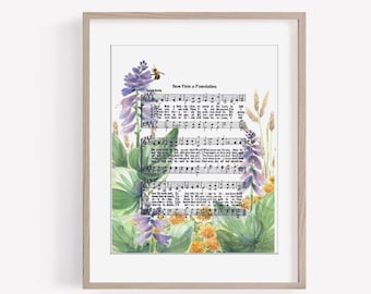 May include: A watercolor painting of purple flowers and green leaves with a bee on a hymn sheet with the words "How Firm a Foundation" printed on it.