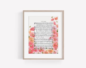 May include: A framed print of the hymn "In the Garden" with watercolor illustrations of pink and peach poppies surrounding the sheet music.