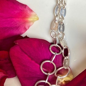 Handmade 3 1/4&quot; Long Dangle Earrings. Sterling Silver. Graduated 7 Ring Sizes With Italian Sterling Silver Connectors.