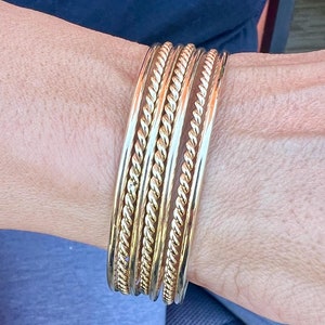 Set of Seven(7) 10 K. Or 14 K. Solid Gold(Not Hollow) 4x2.00mm & 3x2.30mm Round and Twisted Stacking Bangle Bracelets Seven Day(Semanario)
