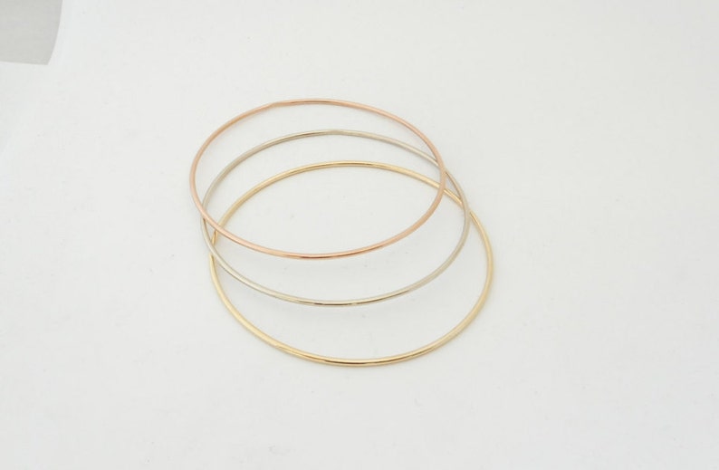 14 K. Solid GoldNot Hollow 1.50 mm. Round Wire 4 to 5.5 grams Stacking Bangle Bracelet image 6