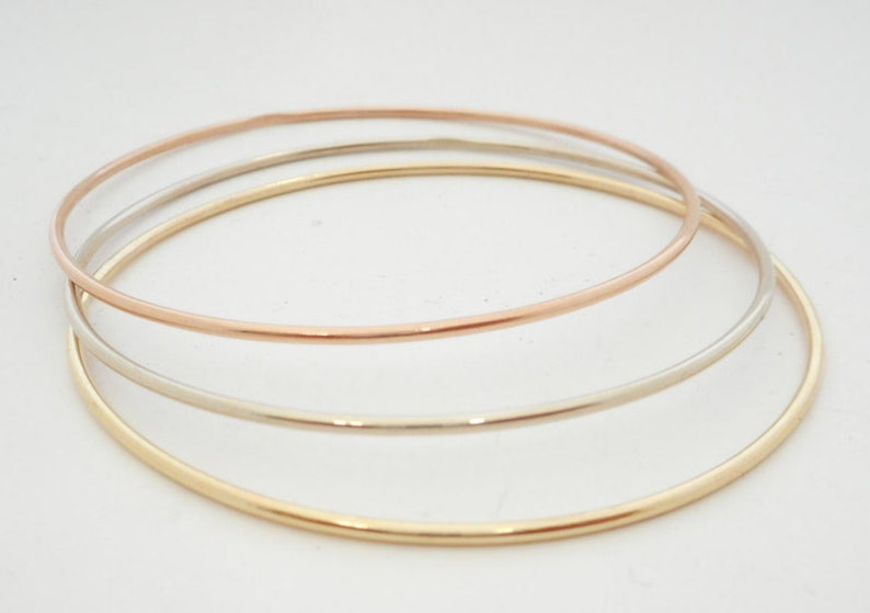 14 K. Solid GoldNot Hollow 1.50 mm. Round Wire 4 to 5.5 grams Stacking Bangle Bracelet image 1