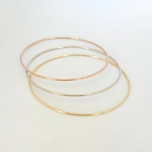 14 K. Solid GoldNot Hollow 1.50 mm. Round Wire 4 to 5.5 grams Stacking Bangle Bracelet image 5