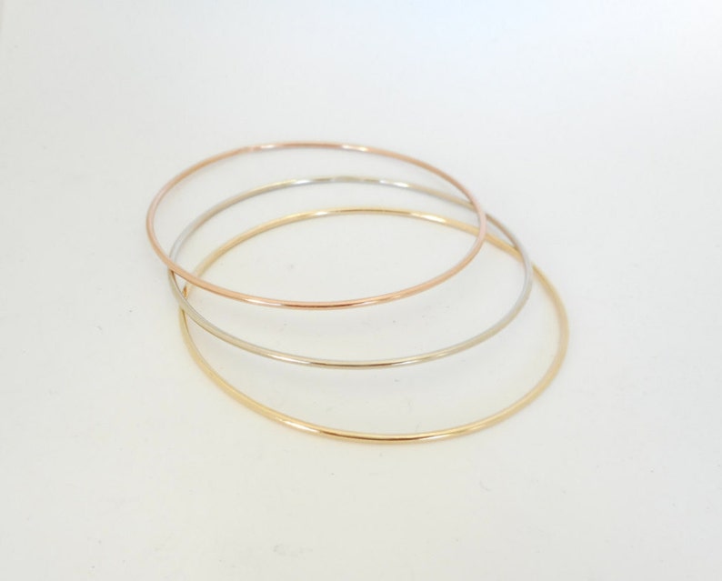 14 K. Solid GoldNot Hollow 1.50 mm. Round Wire 4 to 5.5 grams Stacking Bangle Bracelet image 5