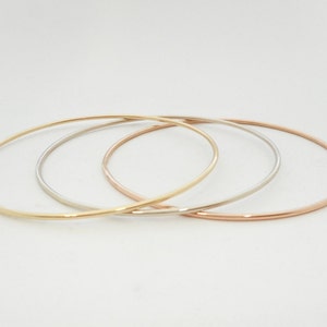 14 K. Solid GoldNot Hollow 1.50 mm. Round Wire 4 to 5.5 grams Stacking Bangle Bracelet image 3