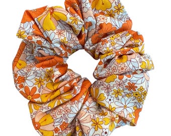 Coletero extragrande con flores vintage en naranja y amarillo