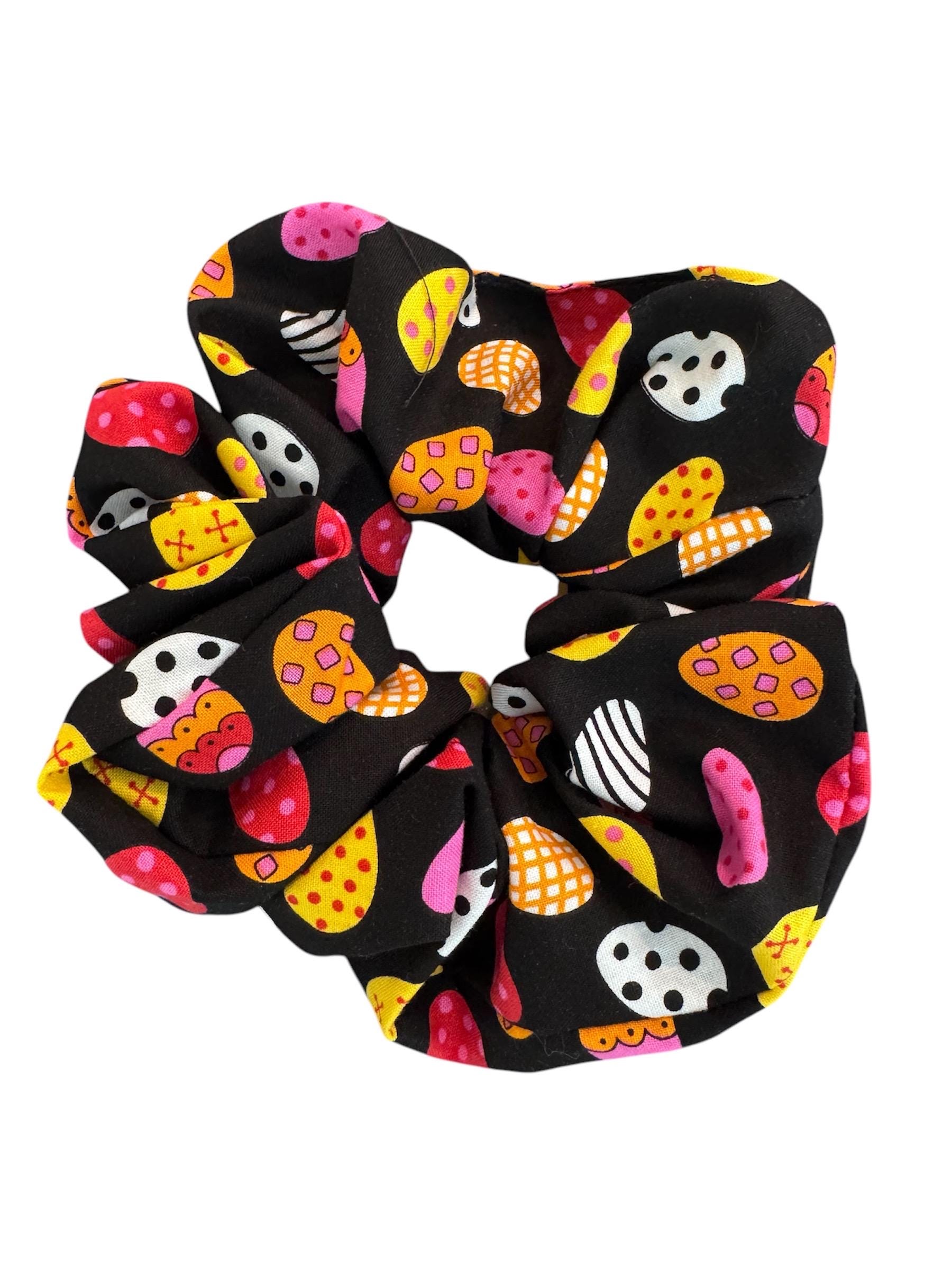 Coletero extragrande con diseño de huevos de Pascua en negro