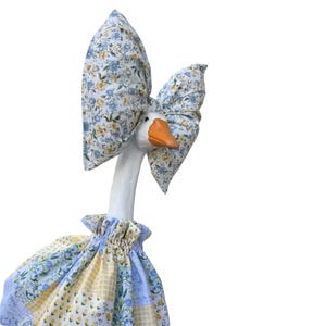 Abito Porch Goose con il grande fiocco originale - Patchwork giallo-blu con fiocco a fiori (23-28 pollici)