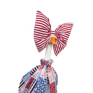 May include: A rustic wooden sign with the text "Welcome to our home" in white lettering. The sign features a distressed finish and a simple, inviting design, perfect for a front porch or entryway.