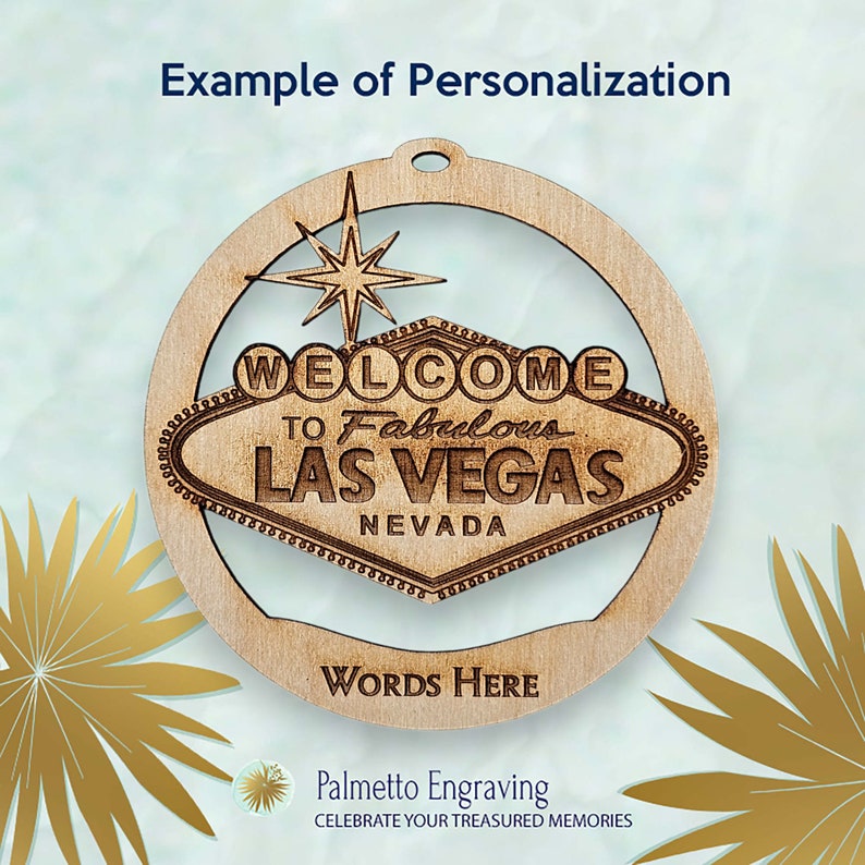 May include: A laser-cut wooden ornament featuring the iconic "Welcome to Fabulous Las Vegas" sign. The ornament includes the text "WORDS HERE" and "Example of Personalization". The design incorporates a star and a circular frame, with a hole for hanging.
