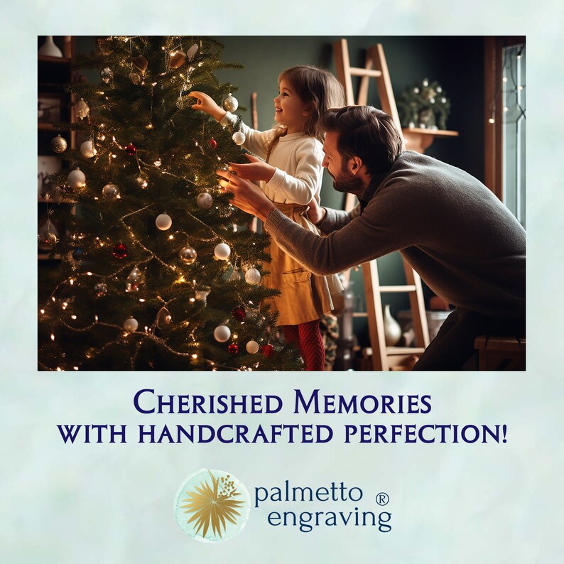 May include: A father and daughter decorate a Christmas tree with ornaments. The tree is lit with white lights and decorated with red and white ornaments. The text "CHERISHED MEMORIES WITH HANDCRAFTED PERFECTION! palmetto engraving" is displayed below the image.