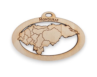 May include: Wooden cutout of the country of Honduras, with the country name "HONDURAS" printed at the top. The cutout is in the shape of the country's outline and includes the borders of each state.