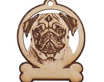 May include: A wooden ornament featuring a laser-engraved image of a pug dog's face in a circle with a bone-shaped tag below. The ornament is a light brown color.