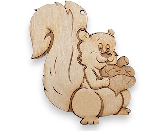 May include: A wooden squirrel ornament holding a nut in its paws. The squirrel is light brown and has a detailed face. The ornament is perfect for adding a touch of whimsy to your holiday decor.