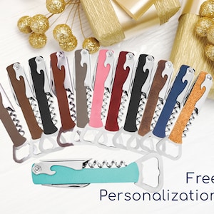May include: A set of 12 multi-colored wine bottle openers with a corkscrew and bottle opener. The openers are made of metal and have a leather-like finish. Free personalization is offered.