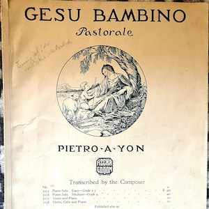 May include: A black and white illustration of a woman and a child sitting under a tree. The title of the piece is "Gesu Bambino Pastorale" by Pietro A-Yon. The image is from a sheet music publication by J. Fischer & Bro. in New York.