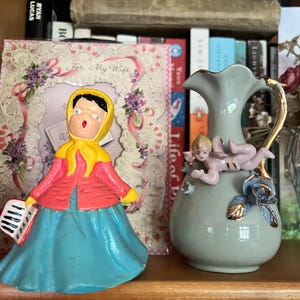 Vintage Chalkware Singing Choir Girl Christmas Caroling Holding Song Book Open Mouth Yellow Scarf Peach Top Blue Skirt