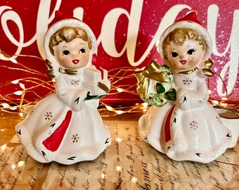 Vintage NAPCO Christmas Snowflake Girls One Holding Present One Holding Wreath Ceramic Candlestick Holders Xmas Figurines