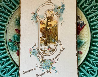 Mooie ongebruikte Victoriaanse tijdperk winters tafereel met elegante gouden rand & vergeet me knopen "Oprechte groeten" Vintage reliëf ansichtkaart
