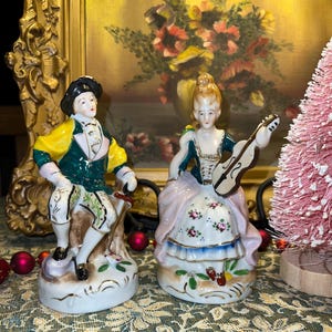 Pair of Vintage Colonial Hand Painted Made in Occupied Japan Porcelain Fancy Lady Violin & Sitting Gentleman Holding Cane Figurines 7&quot; Tall