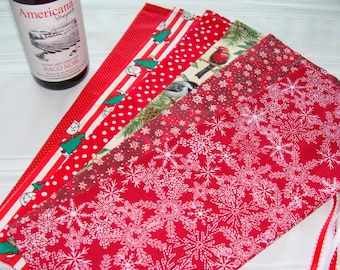 Set of six assorted holiday wine bottle bags with special pricing