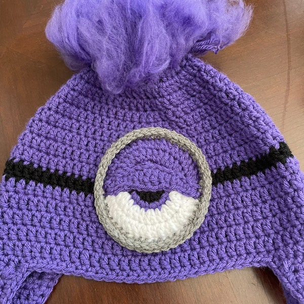 Handmade crochet evil purple minion beanie with ear flaps, and braids. Despicable me hat or costume