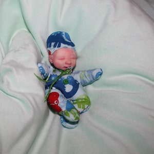 miniature silicone baby tiny tally price